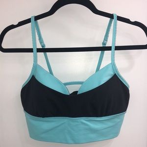 Lululemon sports bra. Unique design. Blue and black. Size 6 or 8. 34C or 34D